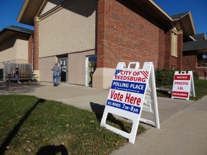 Signs direct people at the entrance of voting at Reedsburg City Hall on Nov. 3. (Photo by Heather Stanek)